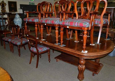 Lot 563 - Reproduction mahogany dining table and ten modern dining chairs with tartan seat covers