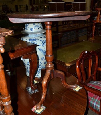 Lot 565 - Georgian circular tripod table