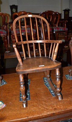 Lot 581 - Child's rocking Windsor chair