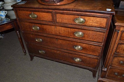 Lot 591 - A Regency crossbanded oak four height chest of drawers