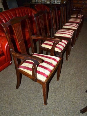 Lot 595 - A set of six mahogany dining chairs including two carvers