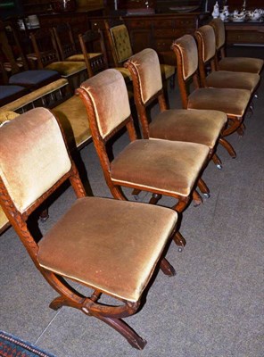 Lot 598 - A set of six cross framed oak dining chairs