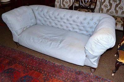 Lot 603 - A Chesterfield settee with drop arms