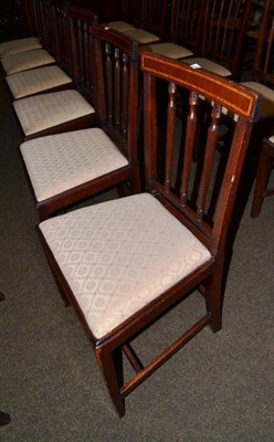 Lot 606 - A set of six George III chairs with drop-in seats