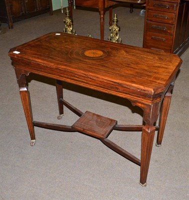 Lot 612 - A Victorian rosewood fold over card table