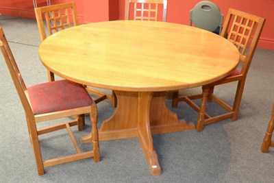 Lot 884A - An Old Mill Furniture Circular 4'6 " Oak Refectory Table, on a cruciform base, with recessed carved