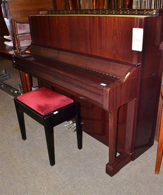 Lot 620 - A modern mahogany cased Yamaha upright piano, serial number U1N E295328