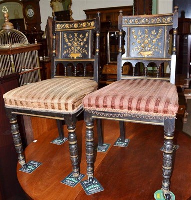 Lot 621 - Pair of ebonised chairs