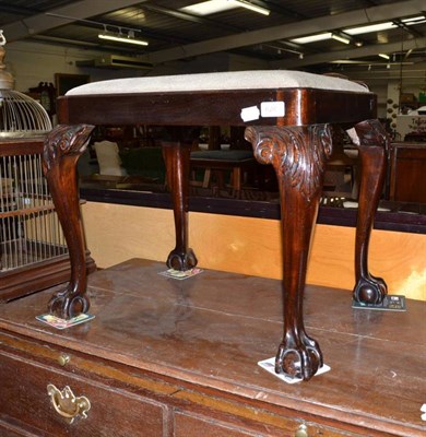 Lot 626 - A 19th century mahogany stool with drop-in needlework seat and carved cabriole legs