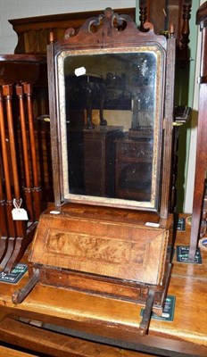 Lot 631 - A Queen Anne style toilet mirror with reeded uprights and feather banded front above a single...