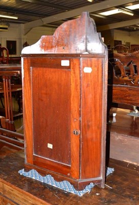 Lot 637 - Mahogany corner cupboard