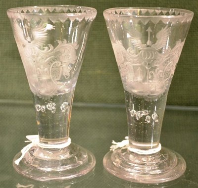 Lot 1 - A Pair of Wine Glasses, mid 18th century, the conical bowls engraved with armorials, on...