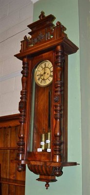 Lot 641 - A double weight driven Vienna type wall clock, with two weights and pendulum