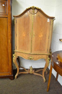 Lot 648 - A kingwood display cabinet in French style with gilt metal mounts