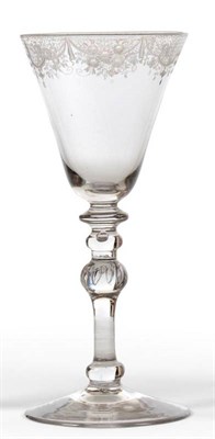Lot 2 - A Newcastle Goblet, circa 1740, the bell shaped bowl engraved with lattice panels hung with...