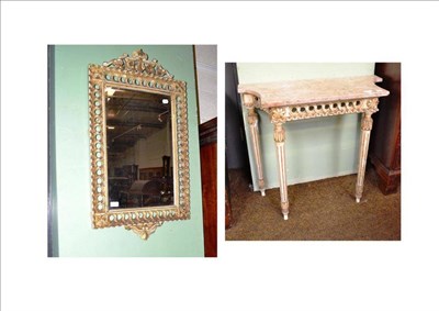 Lot 652 - A Louis XVI style green and parcel gilt console table with mirror