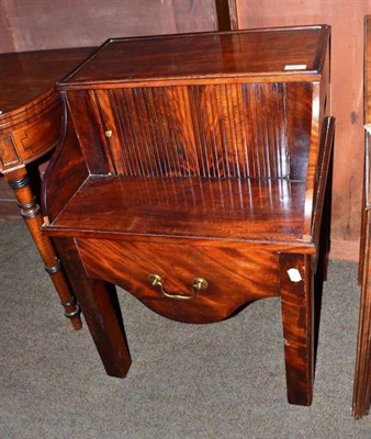 Lot 657 - A Georgian mahogany night table with tambour front, converted