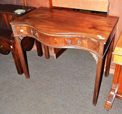 Lot 658 - Chippendale style mahogany serpentine side table