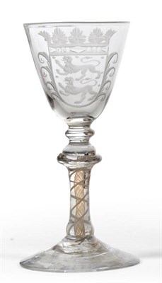 Lot 7 - A Goblet, circa 1770, the rounded funnel bowl engraved with the arms of Friesland, on a...