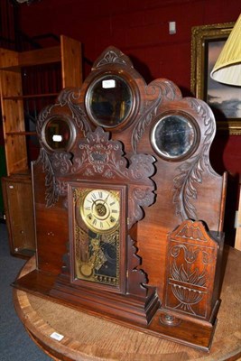 Lot 753 - An unusual Welch electric alarm shelf clock with mirrored superstructure