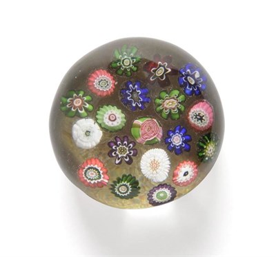 Lot 10 - A Clichy Scattered Millefiori Paperweight, circa 1850, set with assorted canes, including a...