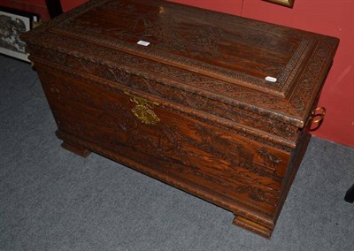 Lot 820 - A carved Eastern camphorwood blanket box