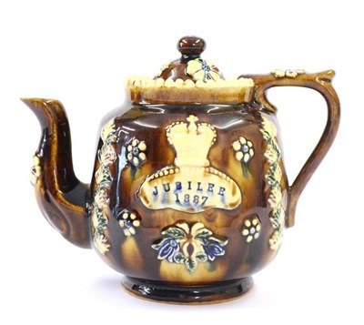 Lot 17 - A Measham Bargeware Golden Jubilee Commemorative Teapot and Cover, dated 1887, of ovoid form,...