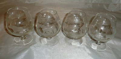 Lot 5 - A set of four brandy balloons, cut and etched with African wild animals in the manner of Roland...