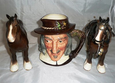 Lot 27 - A Beswick shire mare, a Beswick shire horse with tack and a Doulton character jug D6404 'Izaak...
