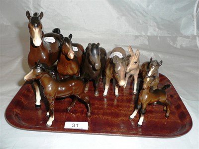 Lot 31 - Two Beswick horses with foals, Shetland pony with foal and donkey with foal