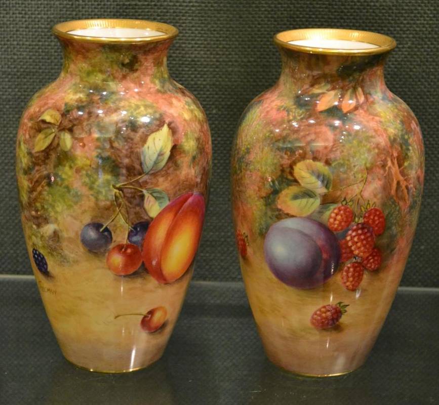 Lot 21 - A Pair of Royal Worcester Porcelain Baluster Vases, 20th century, painted by Harry Ayrton and...