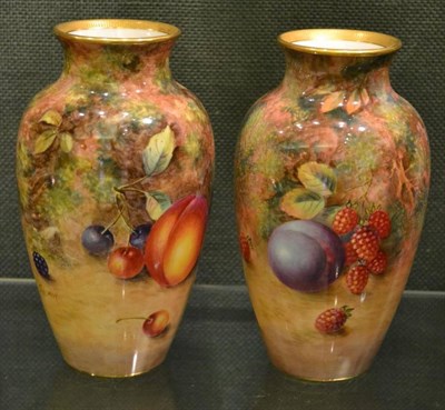 Lot 21 - A Pair of Royal Worcester Porcelain Baluster Vases, 20th century, painted by Harry Ayrton and...