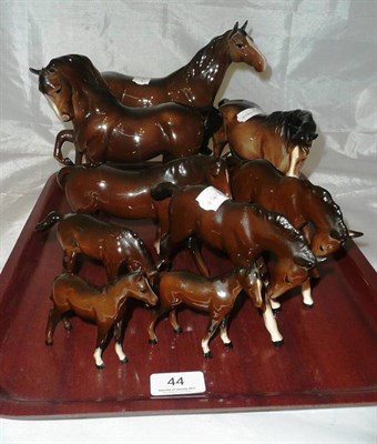 Lot 44 - Four brown Beswick horses with five foals