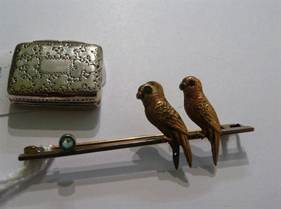 Lot 55 - A silver vinaigrette and a bar brooch set with two parrots