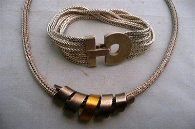 Lot 61 - A contemporary bracelet and necklace, in boxes by Robert Feather