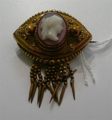 Lot 68 - A hardstone cameo brooch with tassle pendant