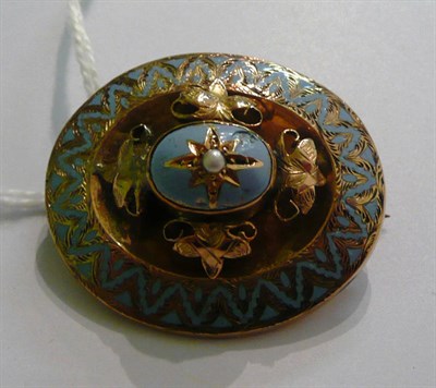Lot 77 - A mourning brooch enamelled in blue, with hair enclosed to the reverse