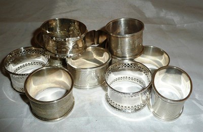 Lot 92 - Eleven silver napkin rings, 10oz