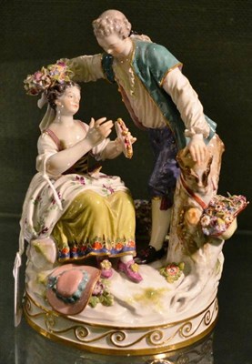 Lot 27 - A Meissen Porcelain Figure Group, 20th century, as 18th century lovers, he holding a garland of...