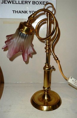 Lot 102 - A brass lamp with frosted glass shade