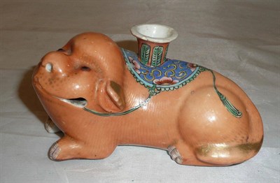 Lot 115 - A Chinese Fo Dog taper stick