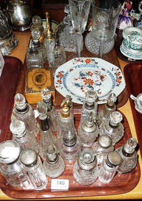 Lot 140 - Two trays of silver mounted scents, bottles, glass etc