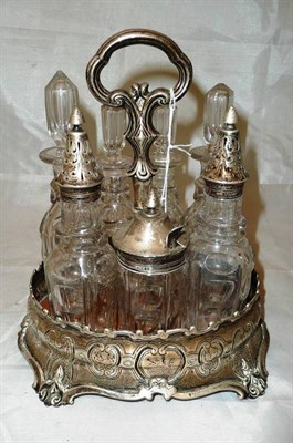 Lot 143 - A Victorian silver seven bottle cruet