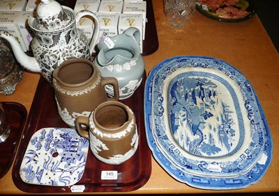 Lot 145 - Three Willow Pattern meat plates, an early 19th century pearlware coffee pot and three buff jugs