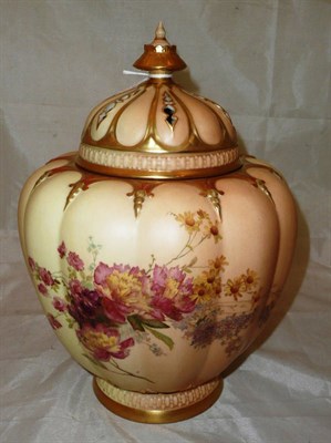 Lot 155 - A Royal Worcester porcelain pot pourri jar and pierced cover, 1897, of melon fluted ovoid form, the