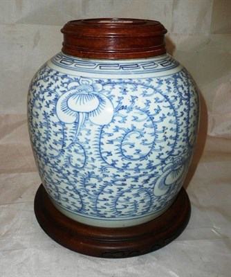 Lot 163 - A 19th century Chinese blue and white ginger jar with wooden cover and stand