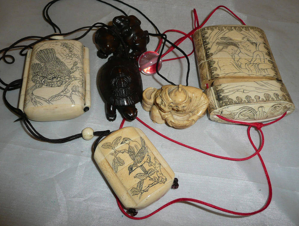 Lot 179 - Three bone inro, each with a carved netsuke