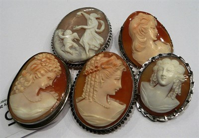Lot 185 - Five cameo brooches depicting maidens, one with a cherub