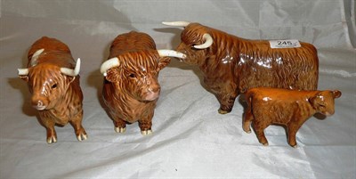Lot 245 - Beswick Highland bull, another, cow and calf