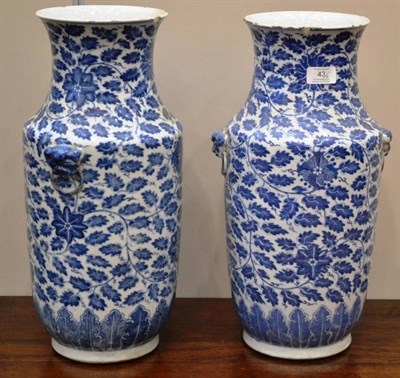 Lot 43 - A Pair of Chinese Porcelain Vases, 19th century, of baluster form with flared necks and ring...